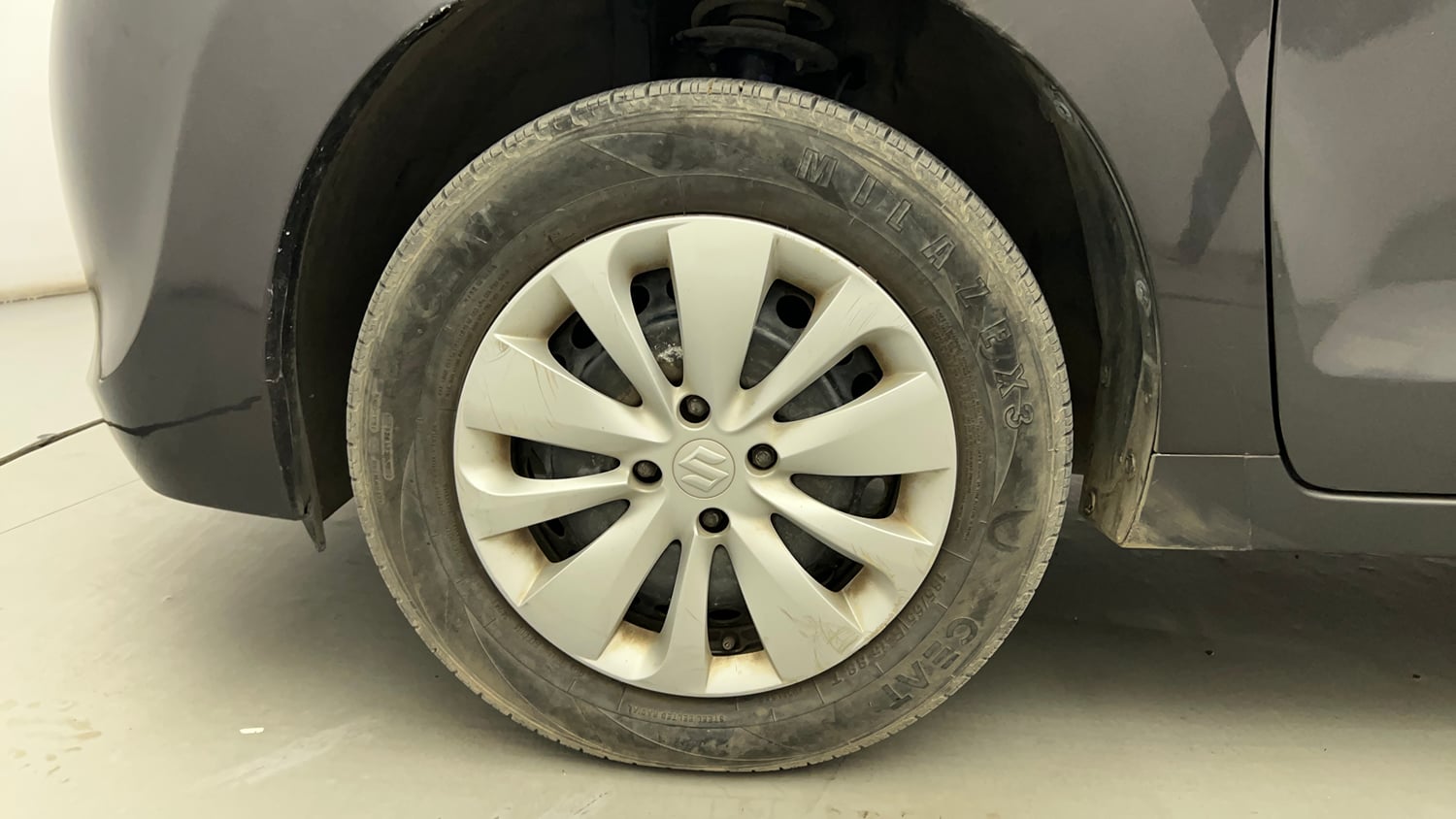 Used 2017 Maruti Suzuki Baleno Delta 1.2 Petrol Manual tyres LEFT FRONT TYRE RIM VIEW