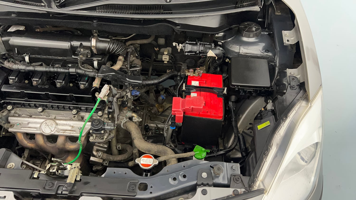 Used 2021 Maruti Suzuki Dzire VXi Petrol Manual engine ENGINE LEFT SIDE VIEW