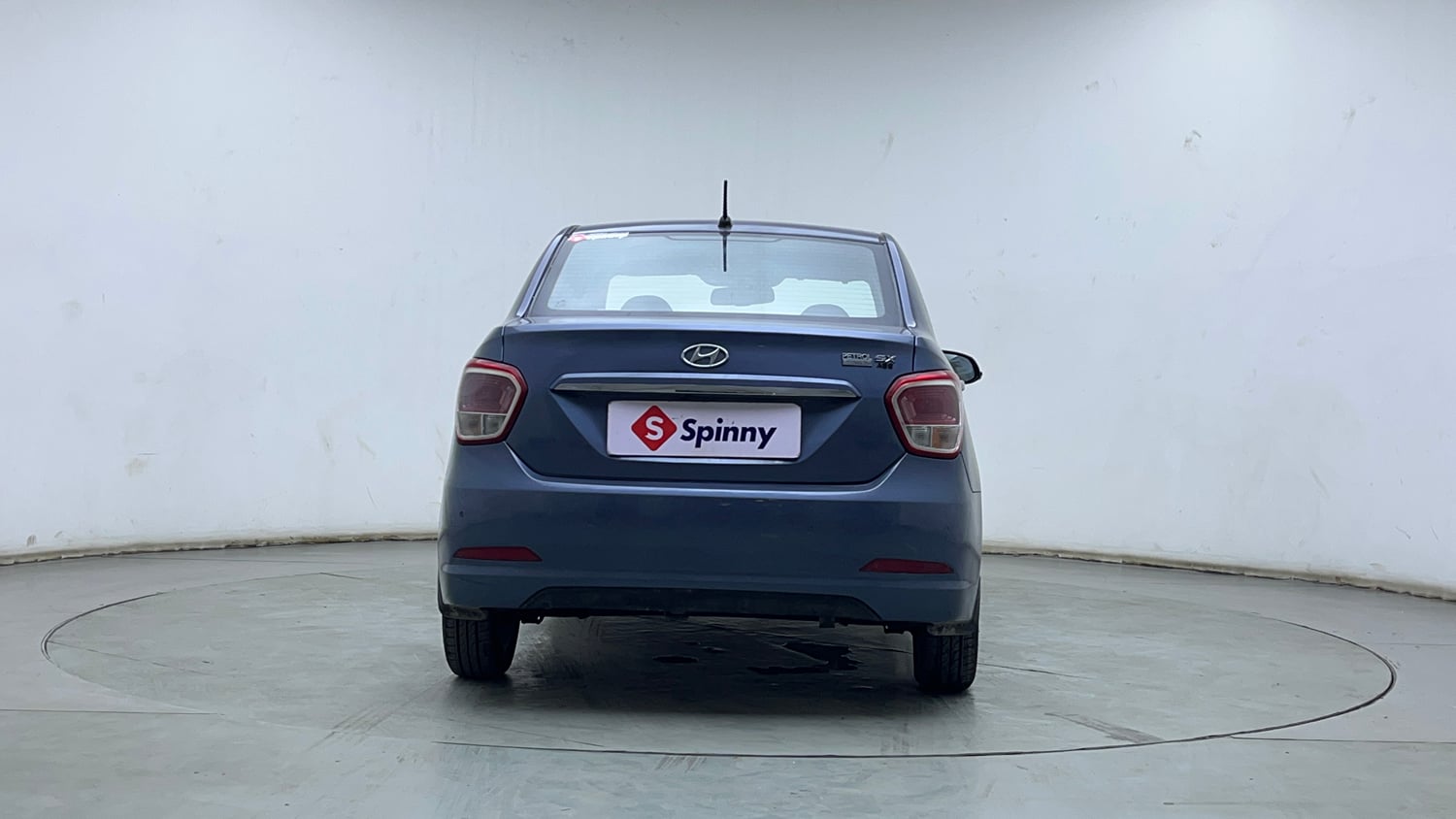 Used 2014 Hyundai Xcent SX 1.2 (O) Petrol Manual exterior BACK VIEW