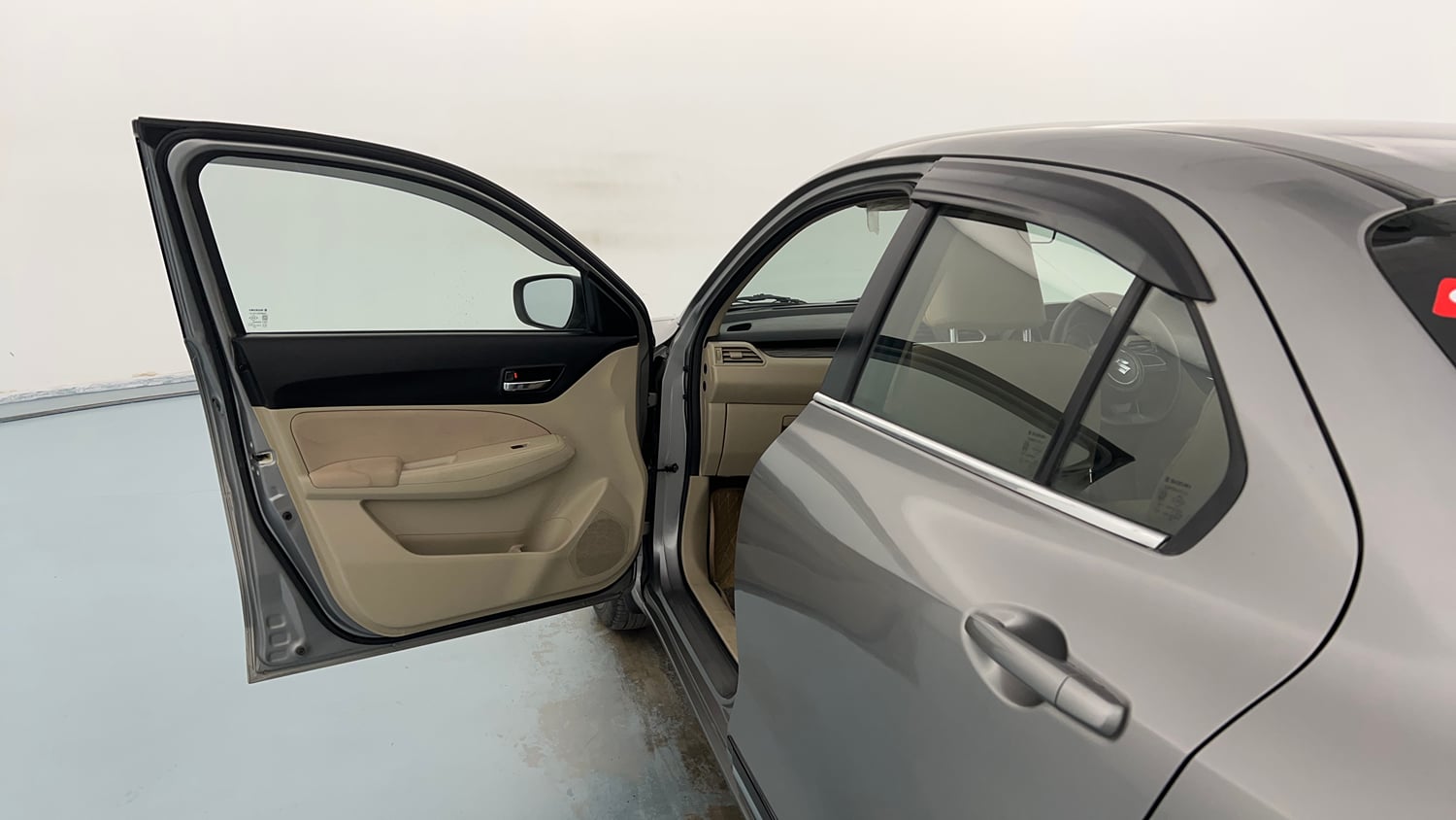 Used 2021 Maruti Suzuki Dzire VXi Petrol Manual interior LEFT FRONT DOOR OPEN VIEW