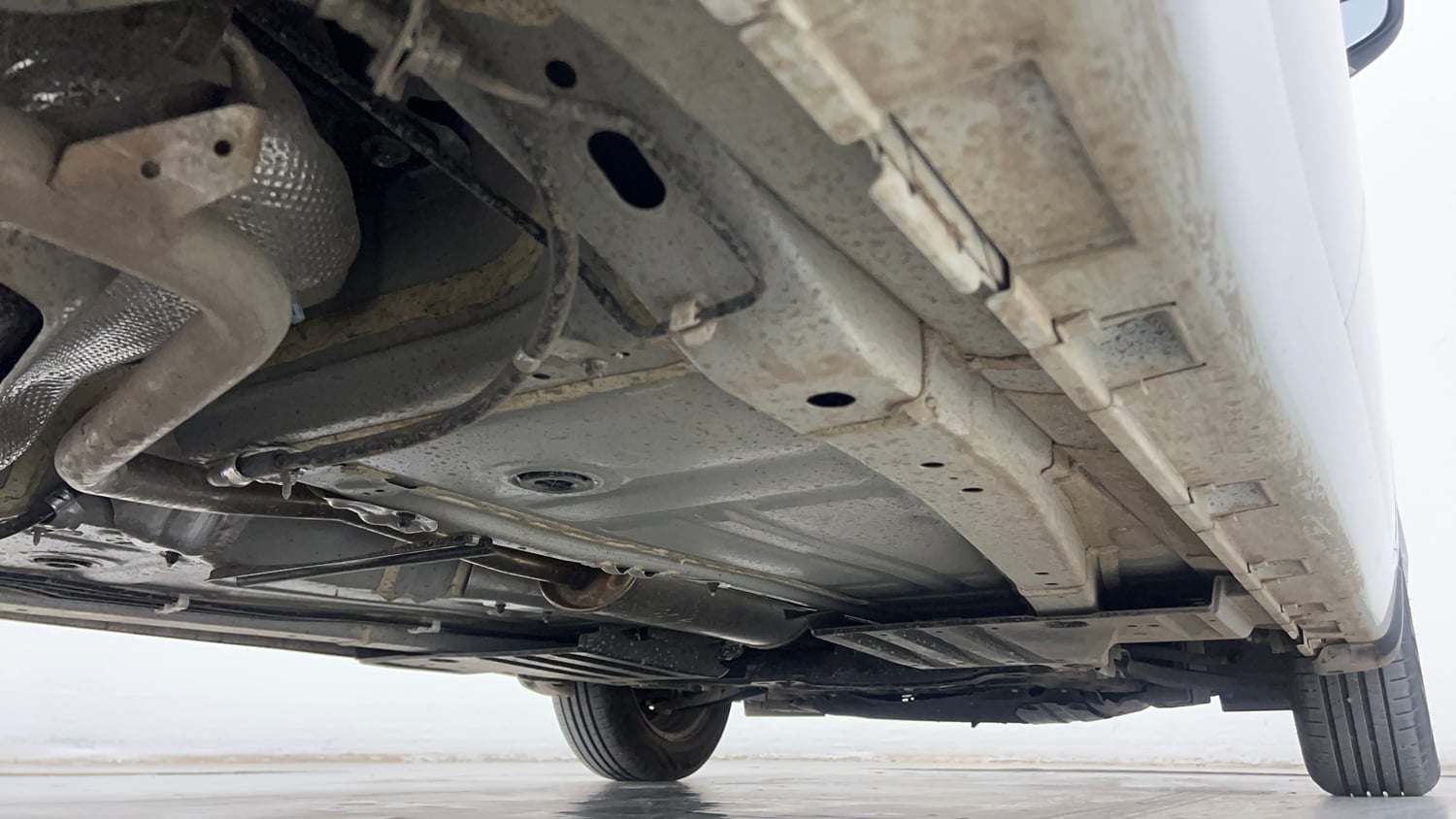 Used 2026 Maruti Suzuki Baleno Sigma MT Petrol Manual extra REAR RIGHT UNDERBODY VIEW