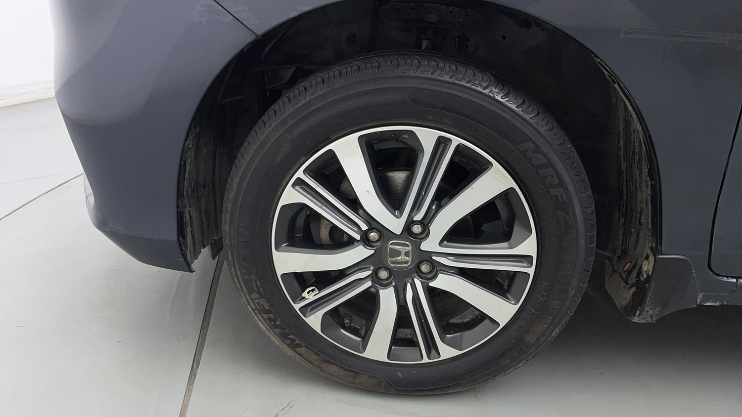 Used 2023 Honda Amaze VX 1.2 Petrol CVT Petrol Automatic tyres LEFT FRONT TYRE RIM VIEW