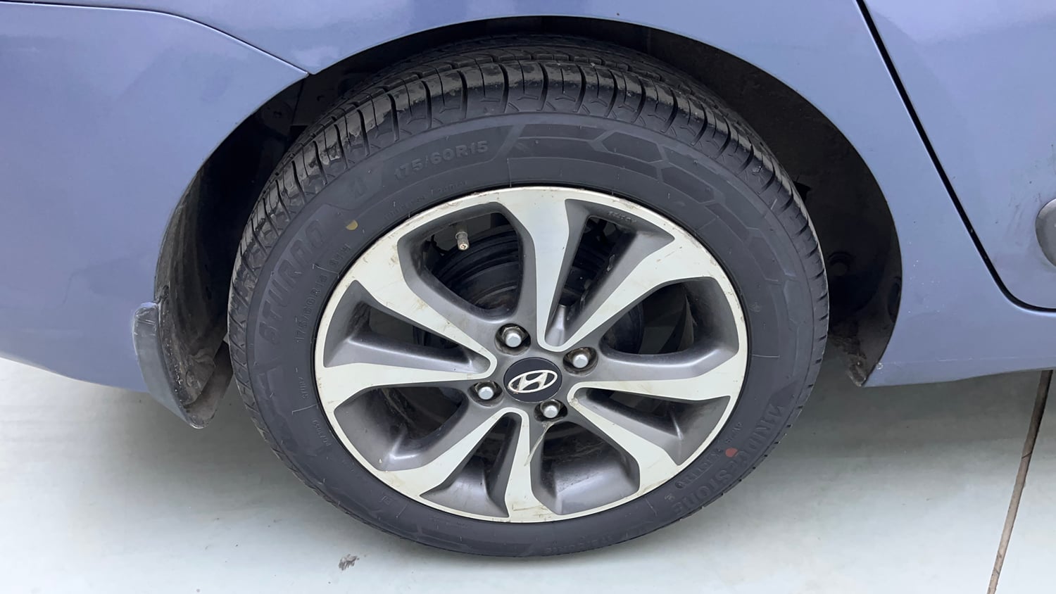 Used 2014 Hyundai Xcent SX 1.2 (O) Petrol Manual tyres RIGHT REAR TYRE RIM VIEW