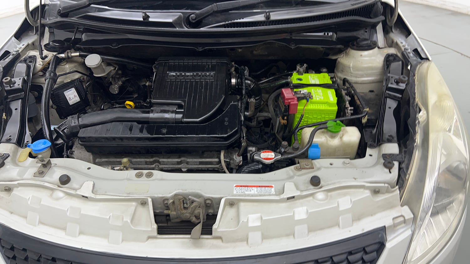 Used 2013 Maruti Suzuki Swift VXI CNG (Outside Fitted) Cng Manual engine ENGINE LEFT SIDE VIEW