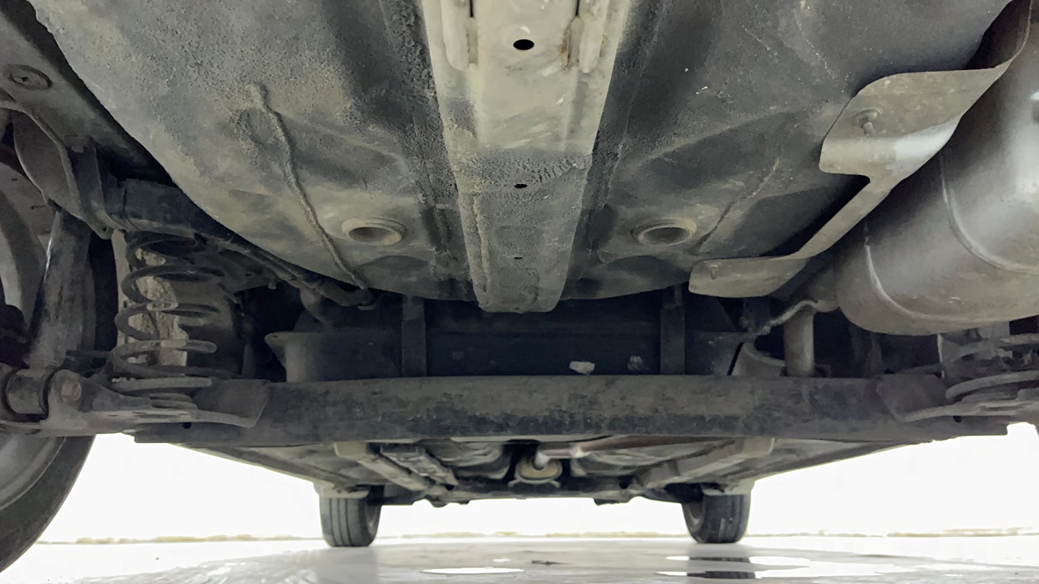 Used 2014 Hyundai Xcent SX 1.2 (O) Petrol Manual extra REAR UNDERBODY VIEW (TAKEN FROM REAR)