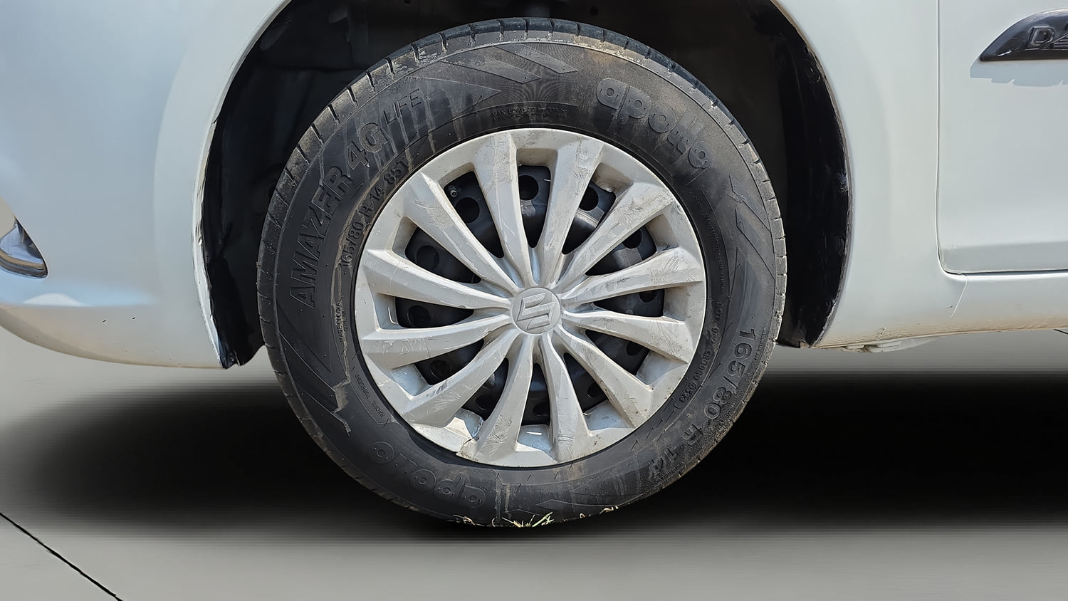 Used 2016 Maruti Suzuki Swift Dzire VXI Petrol Manual tyres LEFT FRONT TYRE RIM VIEW