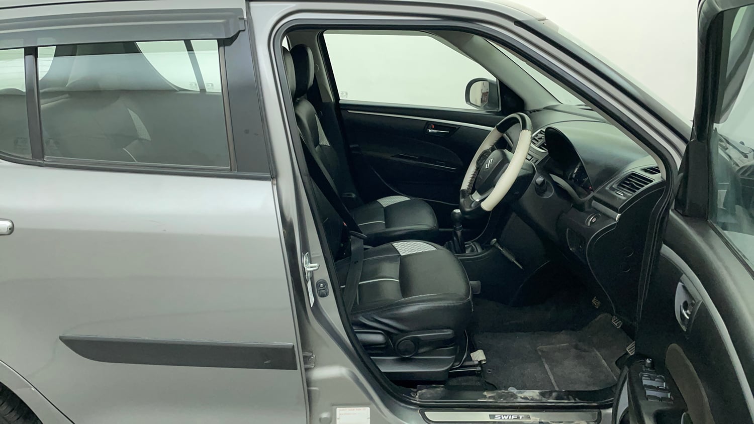 Used 2015 Maruti Suzuki Swift ZXi Petrol Manual interior RIGHT SIDE FRONT DOOR CABIN VIEW