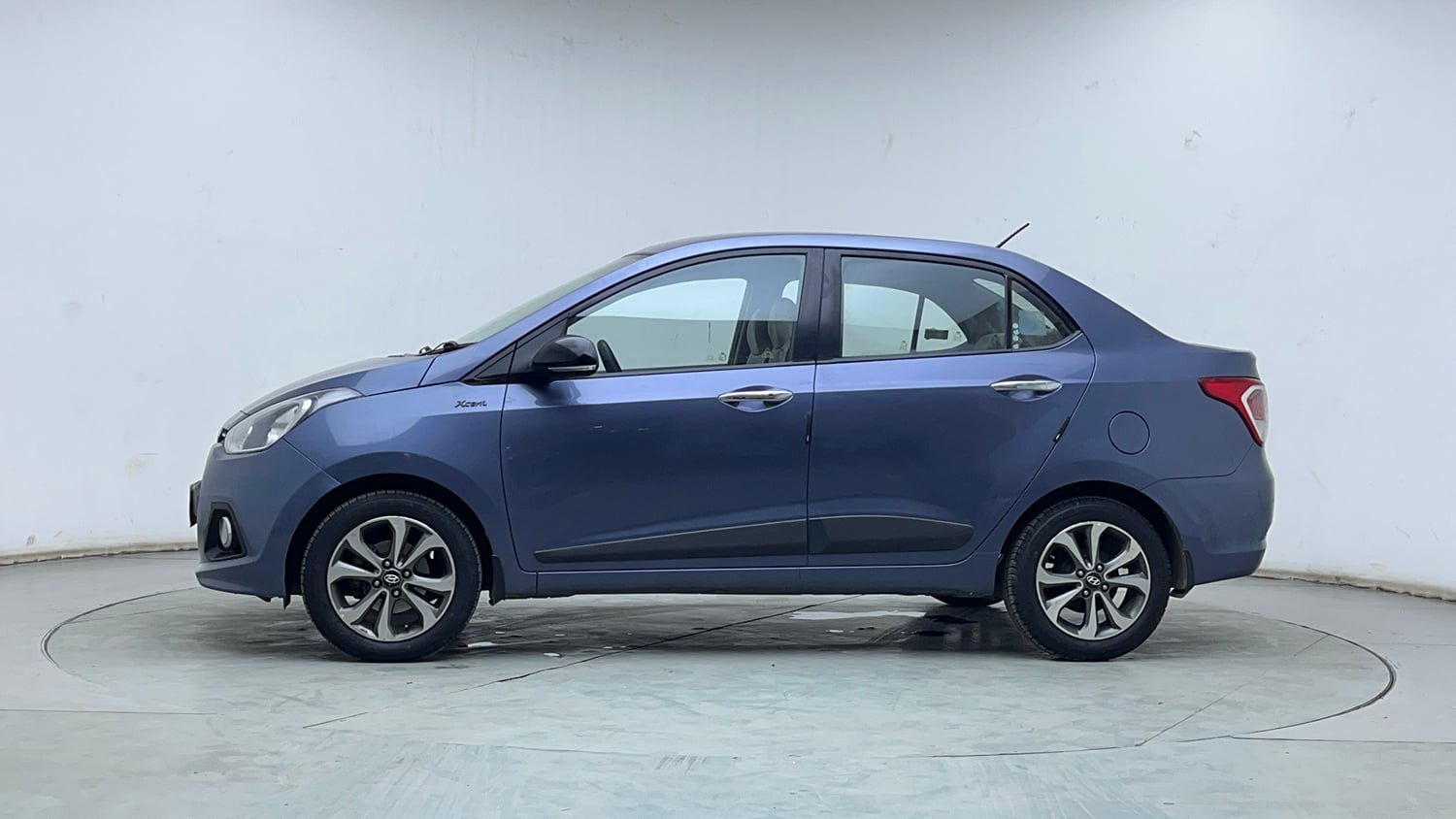 Used 2014 Hyundai Xcent SX 1.2 (O) Petrol Manual exterior LEFT SIDE VIEW