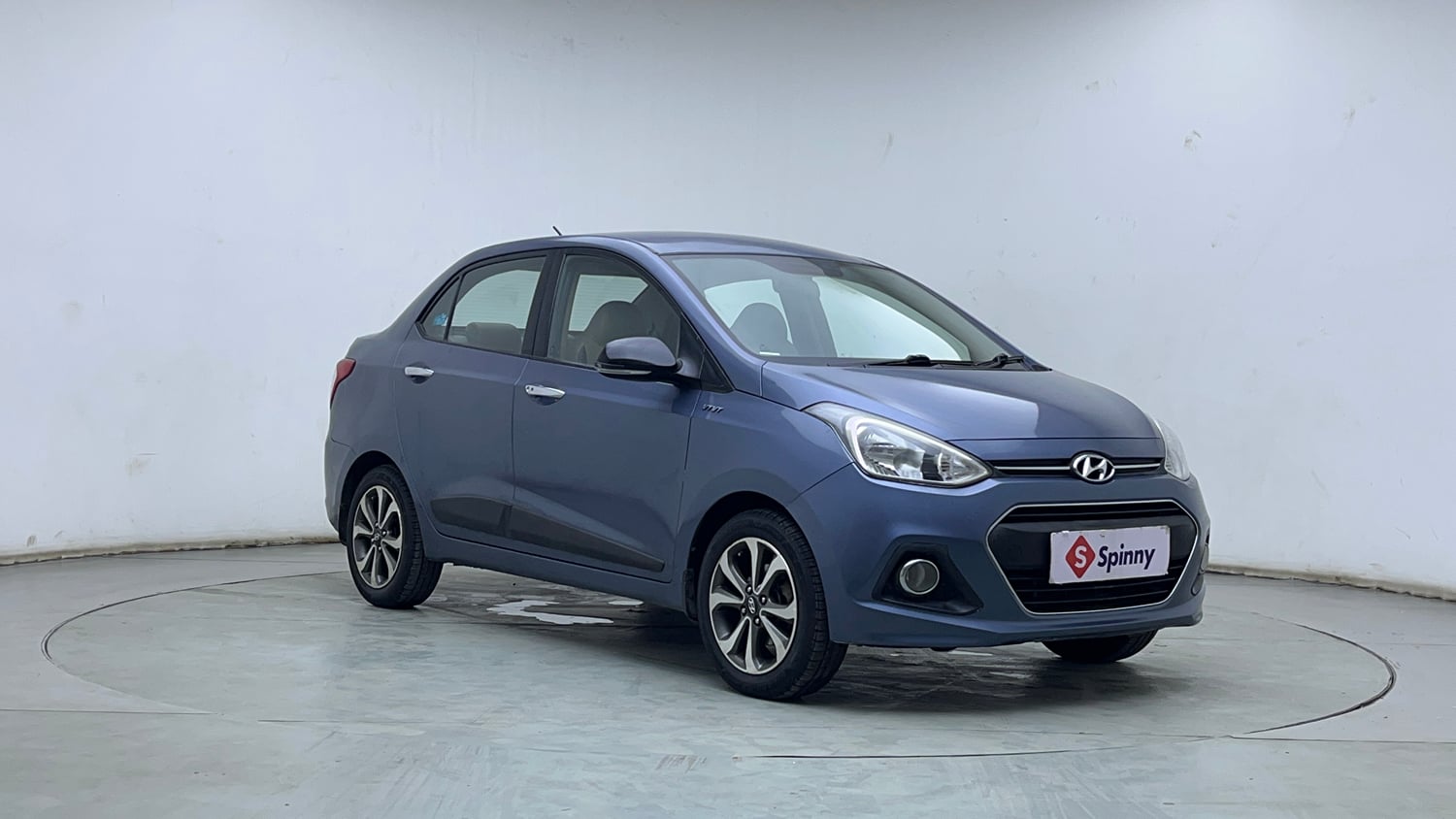 Used 2014 Hyundai Xcent SX 1.2 (O) Petrol Manual exterior RIGHT FRONT CORNER VIEW
