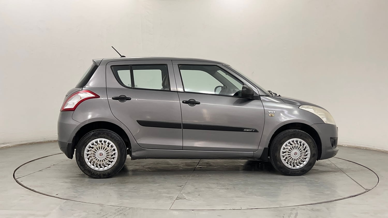 Used 2014 Maruti Suzuki Swift LXi Petrol Manual exterior RIGHT SIDE VIEW