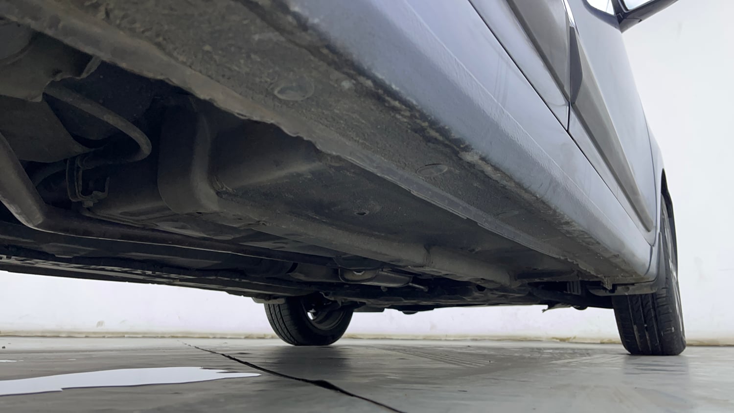 Used 2014 Hyundai Xcent SX 1.2 (O) Petrol Manual extra REAR RIGHT UNDERBODY VIEW
