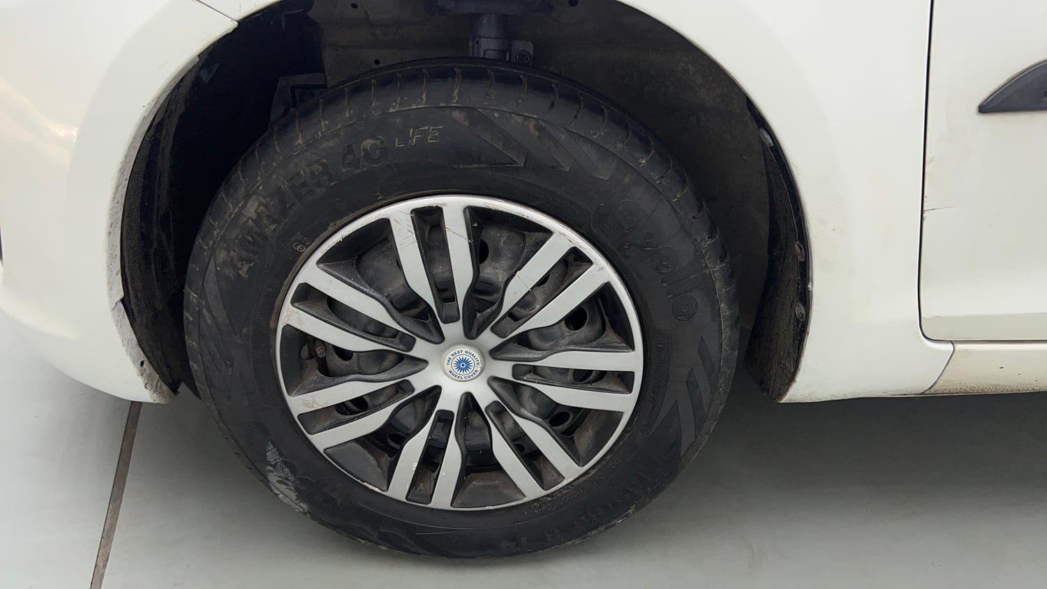 Used 2013 Maruti Suzuki Swift VXI CNG (Outside Fitted) Cng Manual tyres LEFT FRONT TYRE RIM VIEW