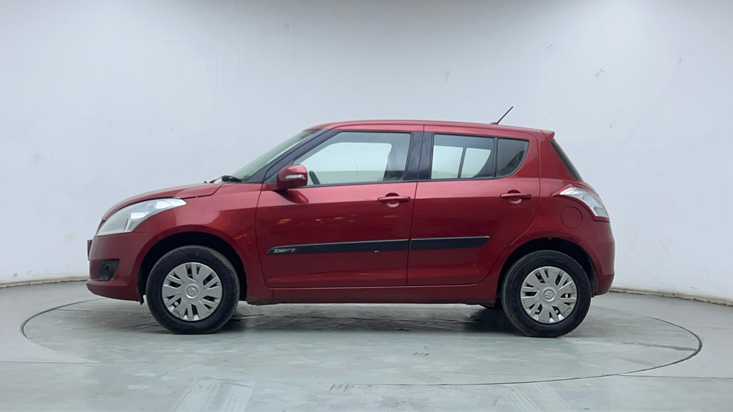 Used 2014 Maruti Suzuki Swift VXi Petrol Manual exterior LEFT SIDE VIEW