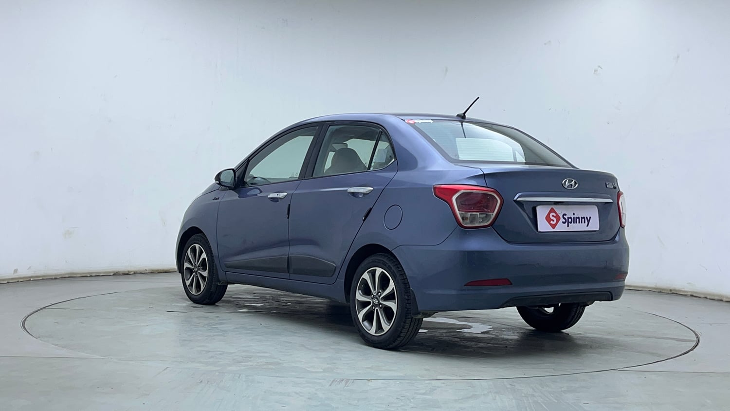 Used 2014 Hyundai Xcent SX 1.2 (O) Petrol Manual exterior LEFT REAR CORNER VIEW