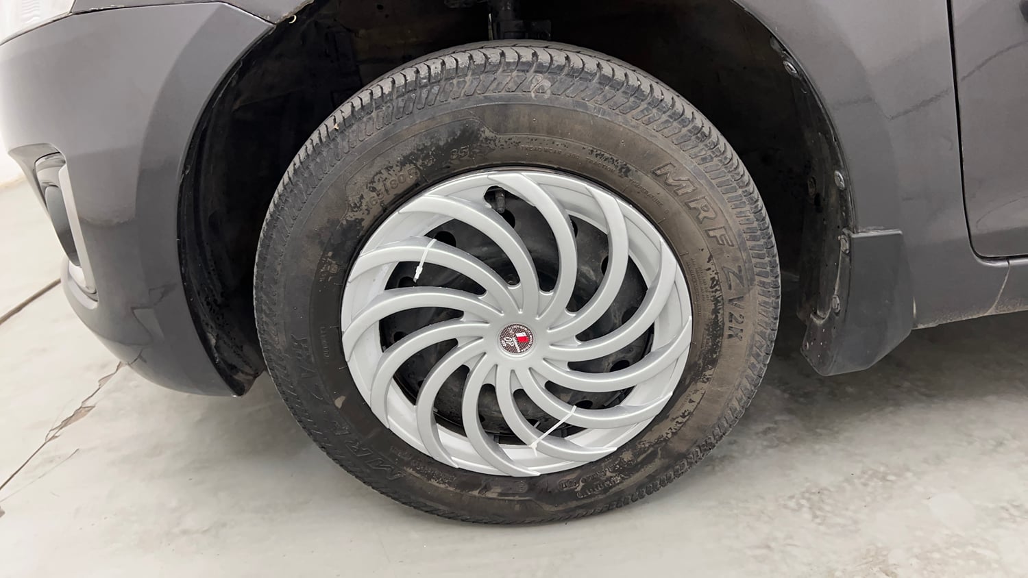 Used 2018 Maruti Suzuki Swift VXI (O) Petrol Manual tyres LEFT FRONT TYRE RIM VIEW
