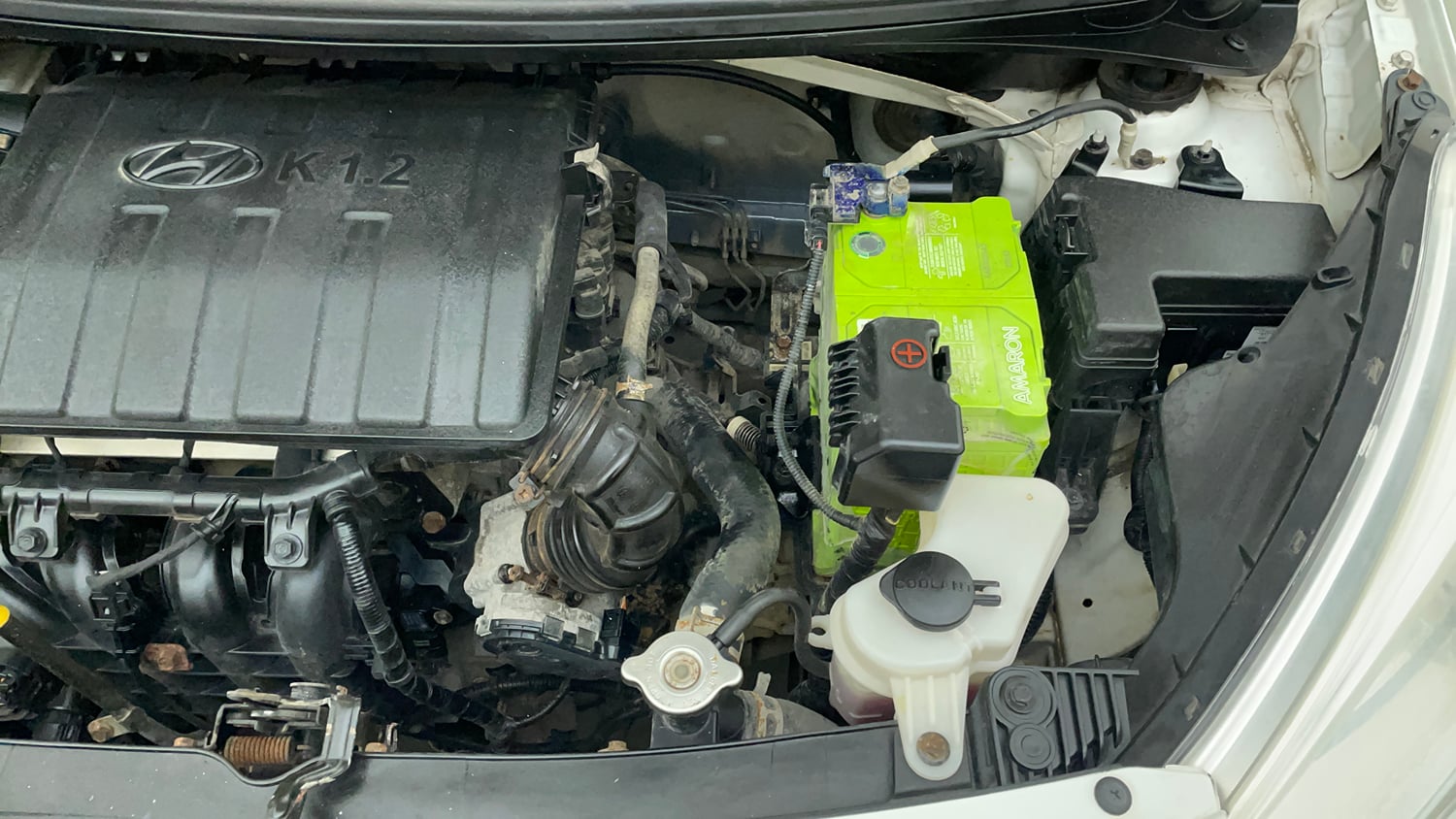 Used 2018 Hyundai Grand i10 Sportz (O) 1.2 Kappa VTVT Petrol Manual engine ENGINE LEFT SIDE VIEW