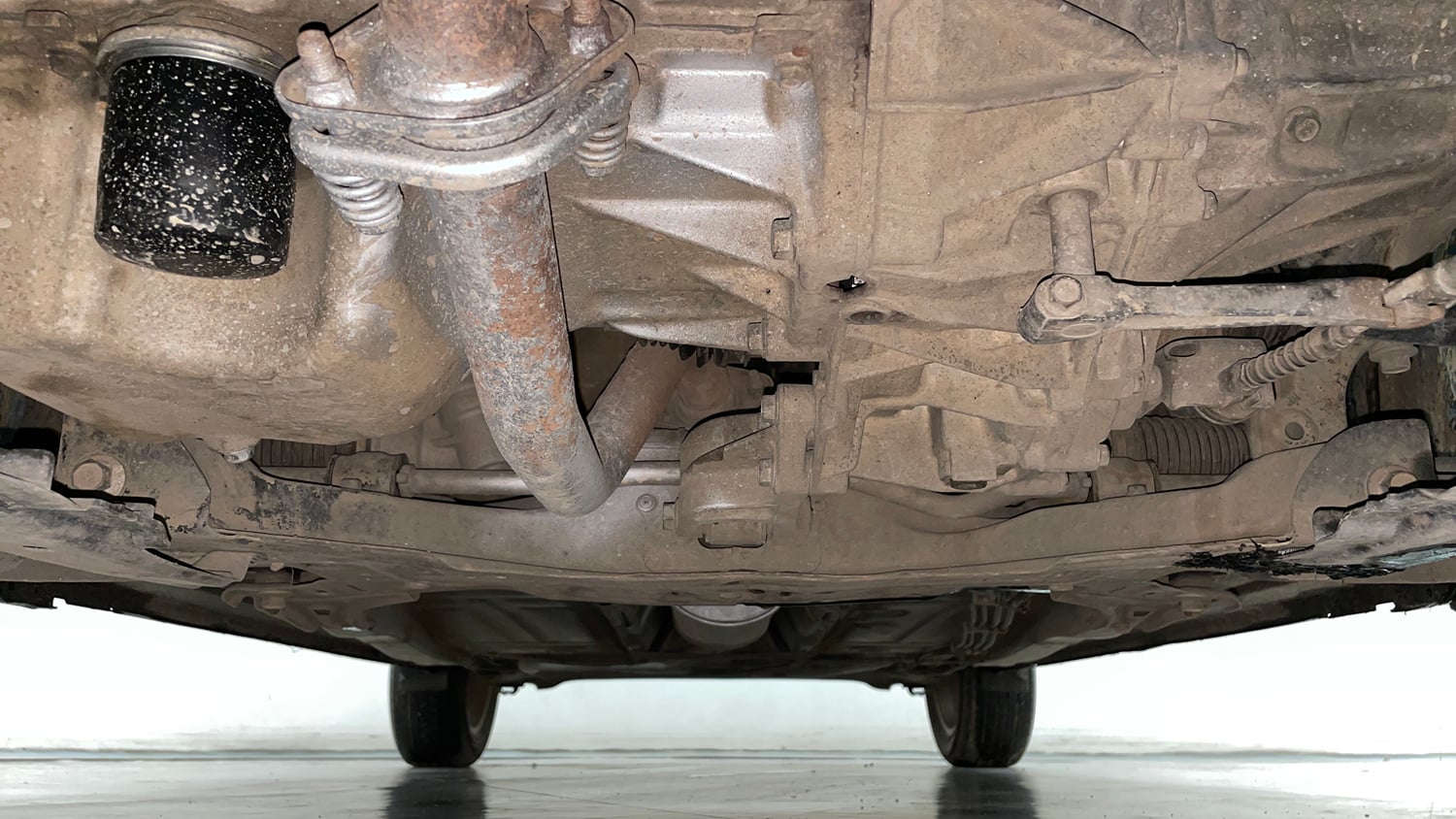 Used 2016 Maruti Suzuki Baleno Zeta 1.2 Petrol Manual extra FRONT LEFT UNDERBODY VIEW