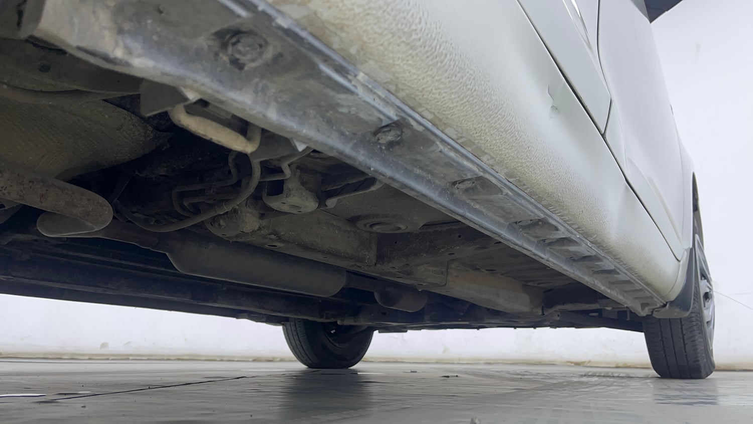 Used 2015 Maruti Suzuki Swift Dzire VXI Petrol Manual extra REAR RIGHT UNDERBODY VIEW