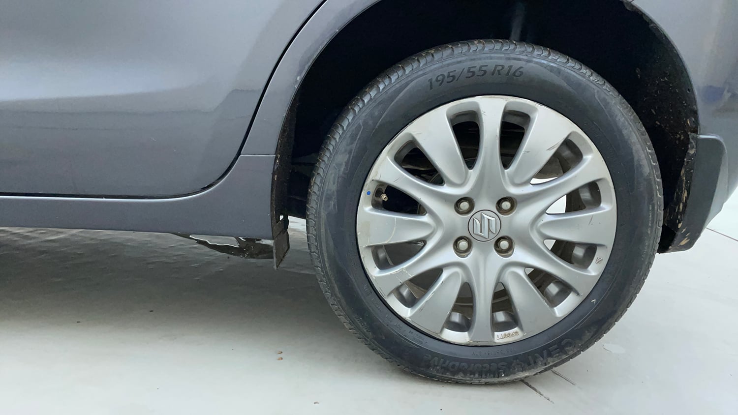 Used 2016 Maruti Suzuki Baleno Zeta 1.2 Petrol Manual tyres LEFT REAR TYRE RIM VIEW