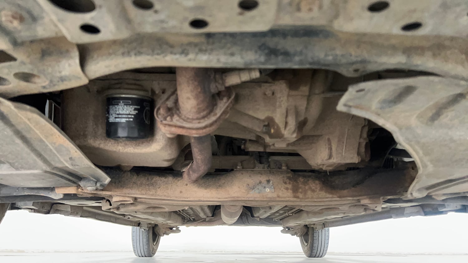 Used 2014 Maruti Suzuki Swift LXi Petrol Manual extra FRONT LEFT UNDERBODY VIEW