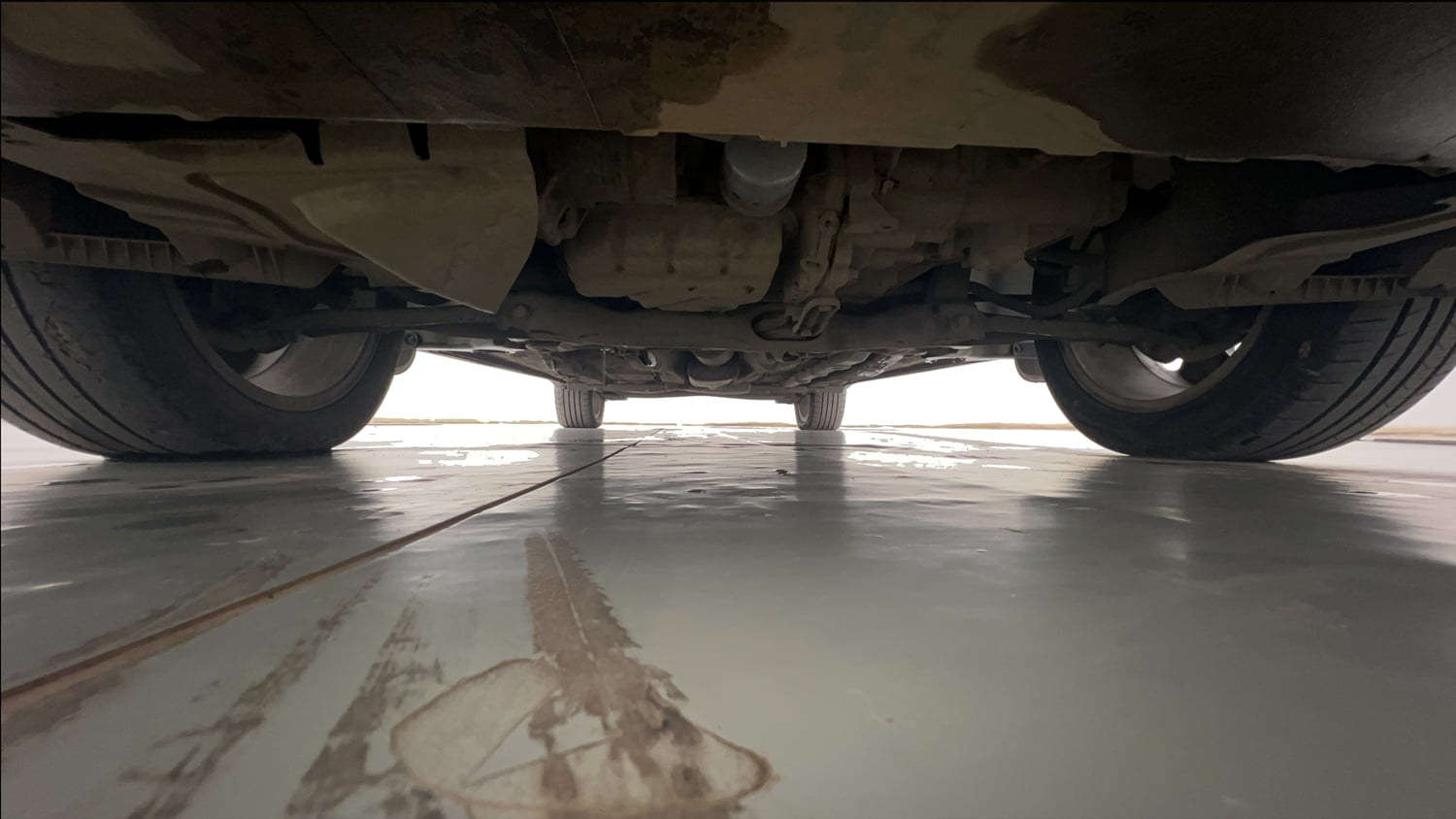 Used 2023 Volkswagen Taigun Topline 1.0 TSI MT Petrol Manual extra FRONT LEFT UNDERBODY VIEW