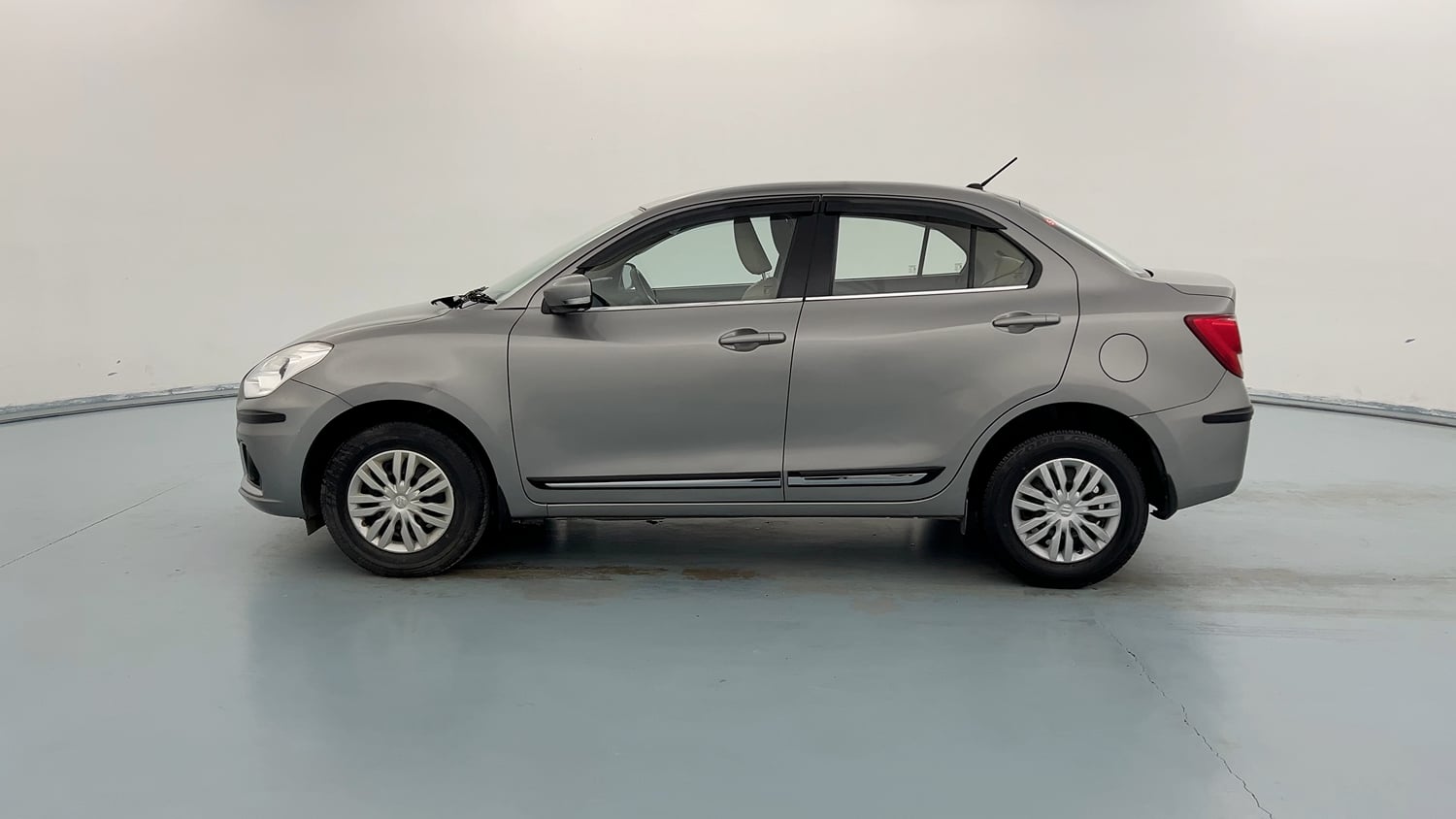 Used 2021 Maruti Suzuki Dzire VXi Petrol Manual exterior LEFT SIDE VIEW