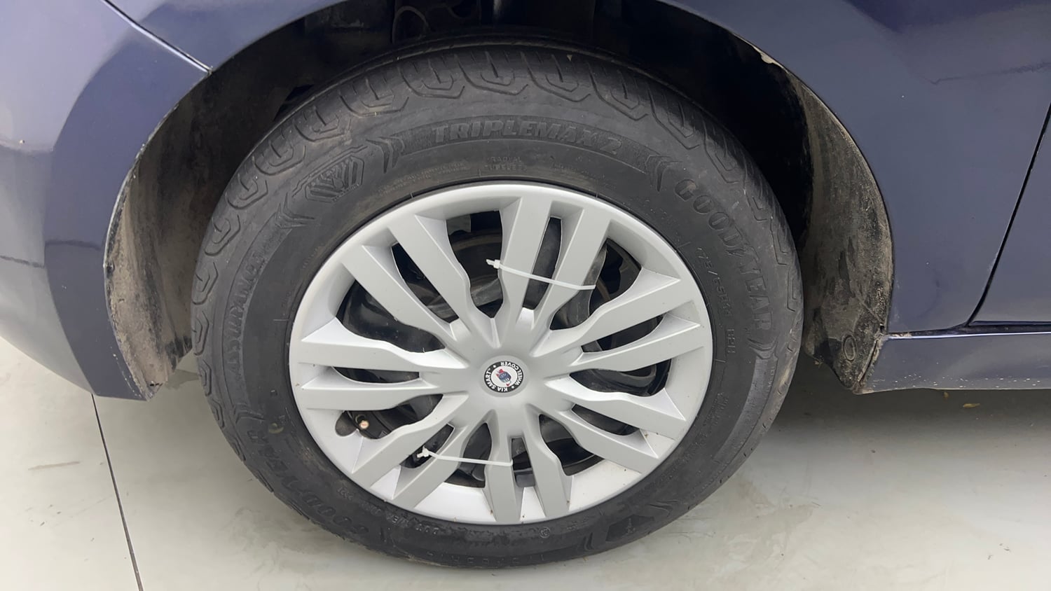 Used 2021 Tata Tiago XZ CNG( Outside Fitted ) Cng Manual tyres LEFT FRONT TYRE RIM VIEW