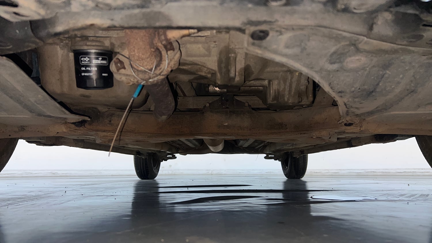 Used 2013 Maruti Suzuki Swift VXI CNG (Outside Fitted) Cng Manual extra FRONT LEFT UNDERBODY VIEW