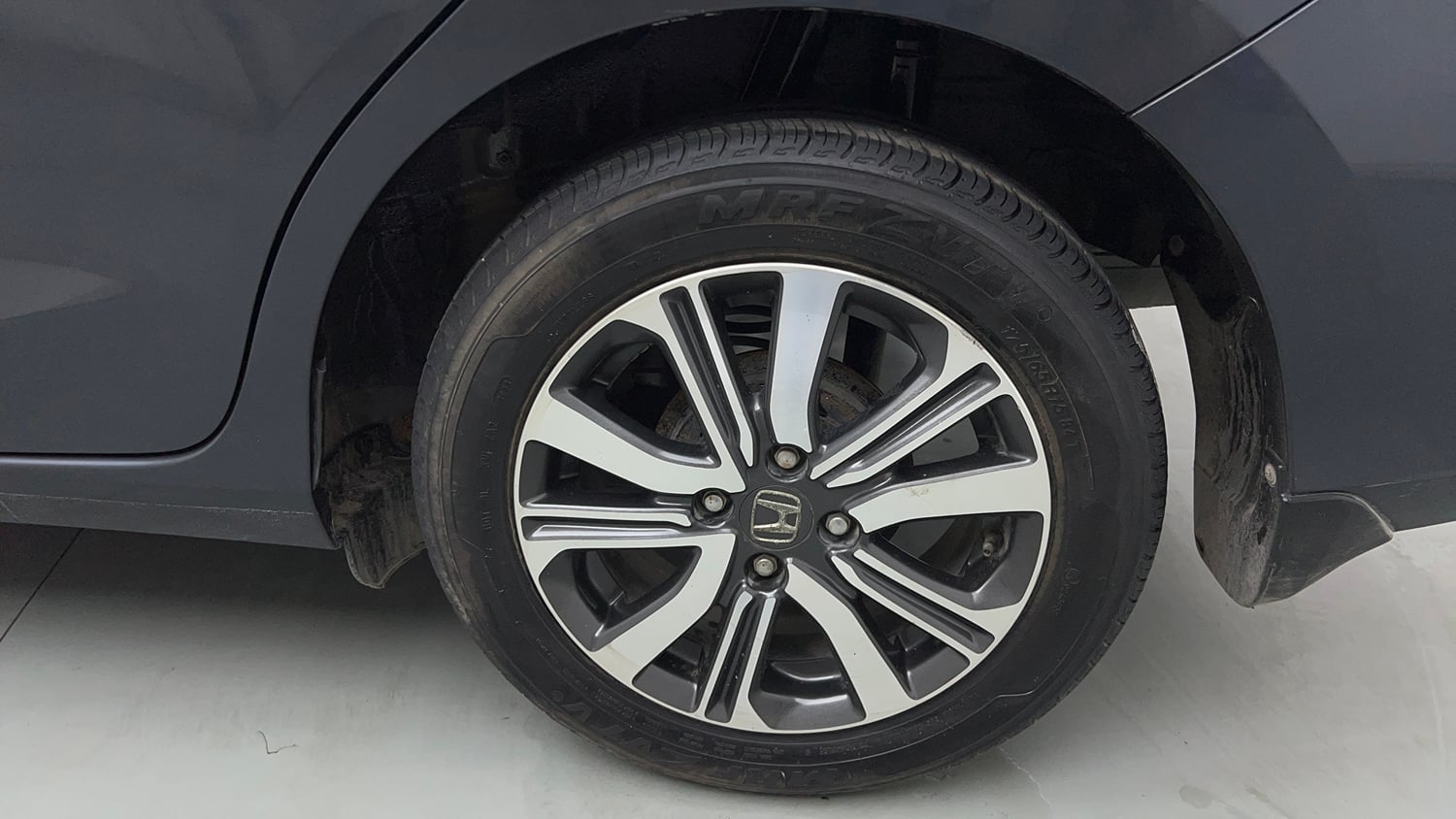 Used 2023 Honda Amaze VX 1.2 Petrol CVT Petrol Automatic tyres LEFT REAR TYRE RIM VIEW