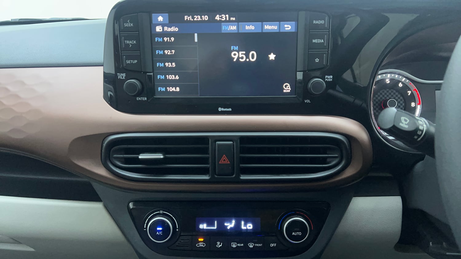 Used 2021 Hyundai Aura SX Plus 1.2 AMT Petrol Petrol Automatic interior MUSIC SYSTEM & AC CONTROL VIEW