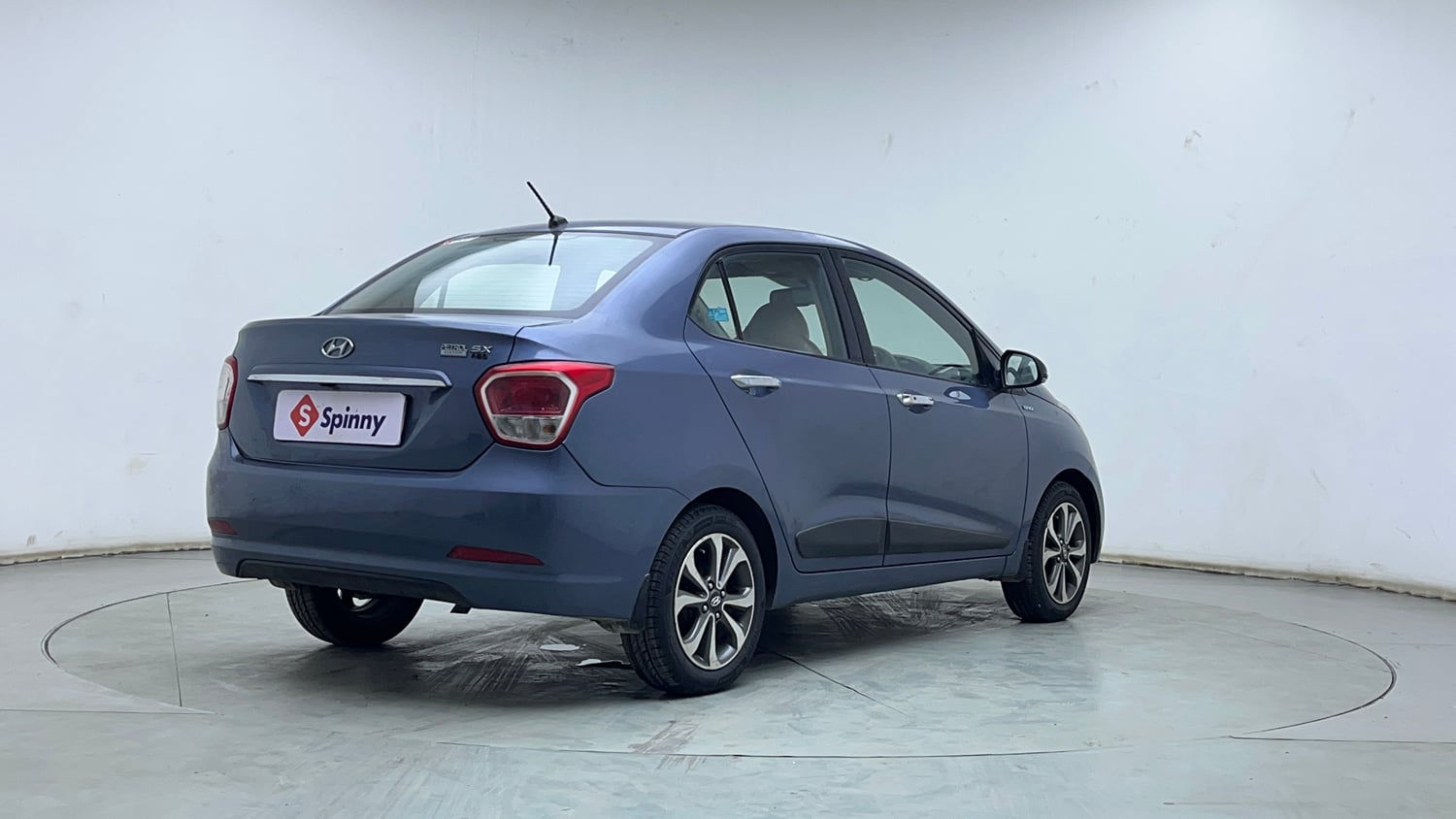 Used 2014 Hyundai Xcent SX 1.2 (O) Petrol Manual exterior RIGHT REAR CORNER VIEW