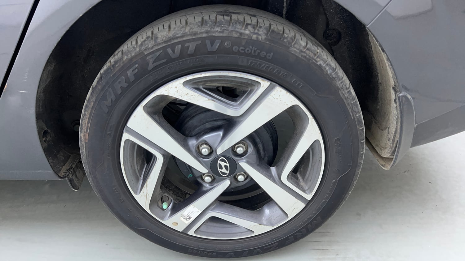 Used 2021 Hyundai Aura SX Plus 1.2 AMT Petrol Petrol Automatic tyres LEFT REAR TYRE RIM VIEW