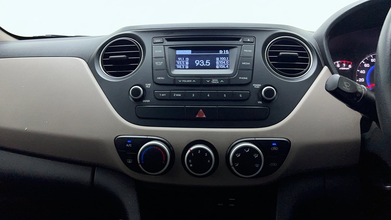 Used 2015 Hyundai Grand i10 Sportz 1.2 Kappa VTVT Petrol Manual interior MUSIC SYSTEM & AC CONTROL VIEW