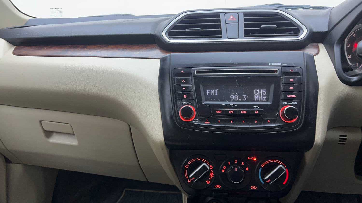 Used 2019 Maruti Suzuki Dzire VXi Petrol Manual interior MUSIC SYSTEM & AC CONTROL VIEW