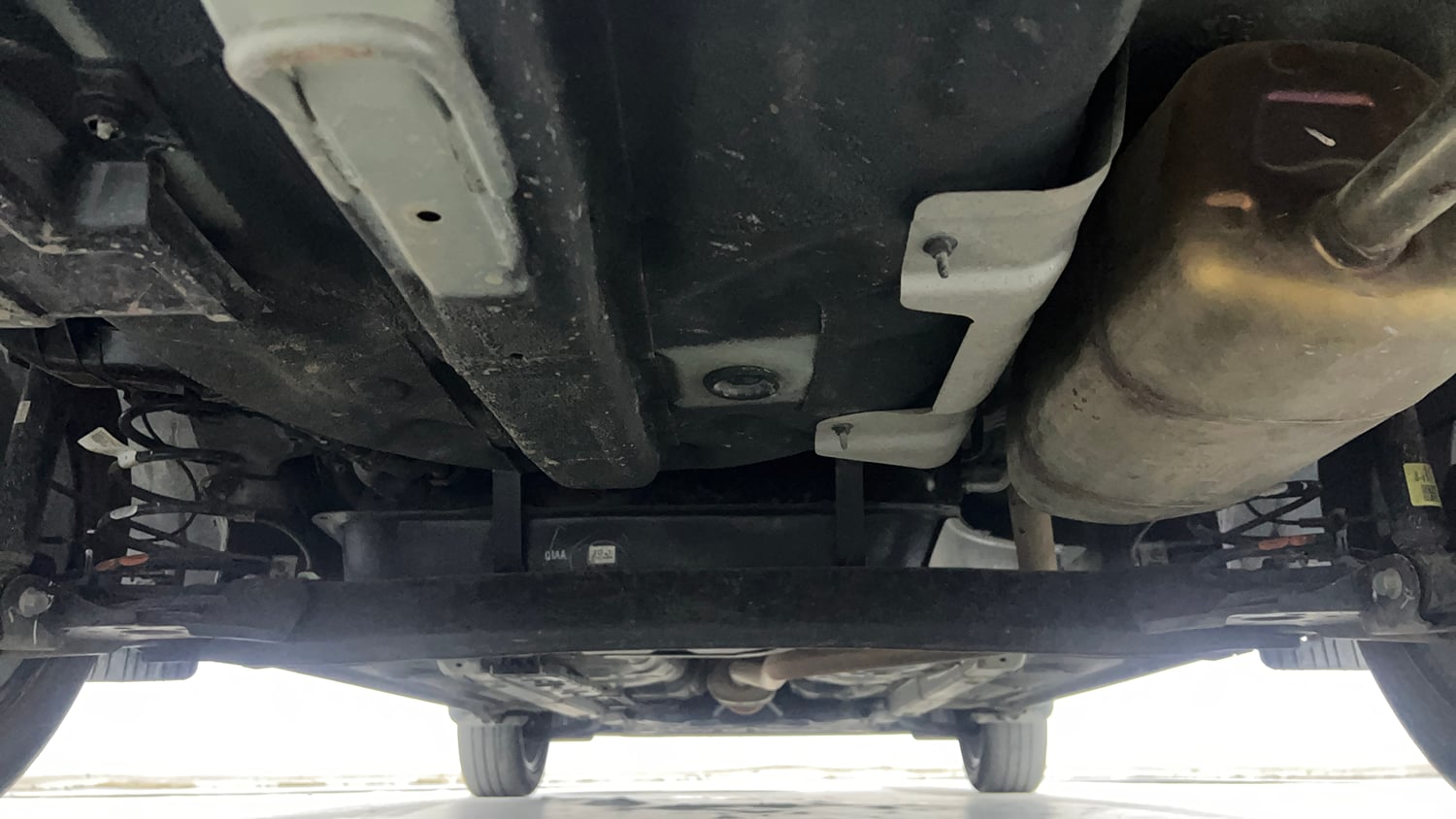 Used 2021 Hyundai Aura SX Plus 1.2 AMT Petrol Petrol Automatic extra REAR UNDERBODY VIEW (TAKEN FROM REAR)