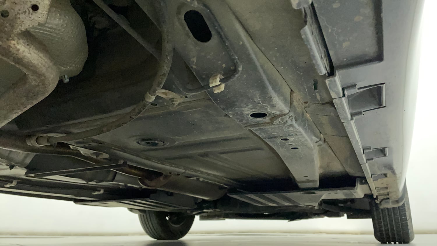 Used 2024 Maruti Suzuki Baleno Sigma MT Petrol Manual extra REAR RIGHT UNDERBODY VIEW