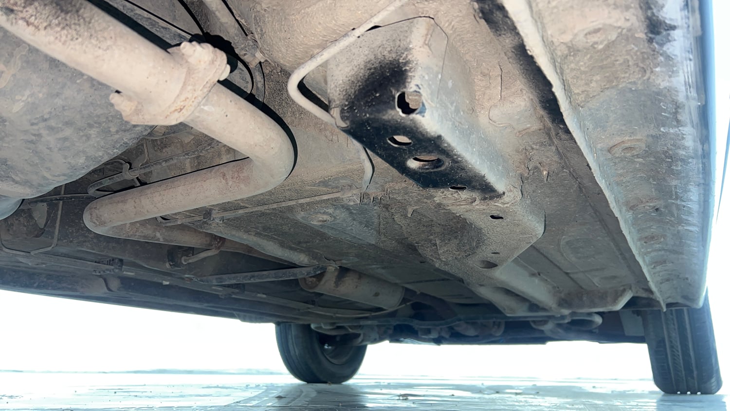 Used 2021 Tata Tiago XZ CNG( Outside Fitted ) Cng Manual extra REAR RIGHT UNDERBODY VIEW