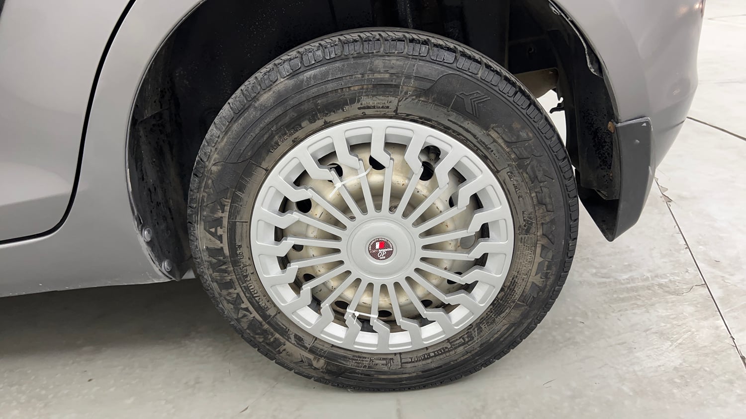 Used 2014 Maruti Suzuki Swift LXi Petrol Manual tyres LEFT REAR TYRE RIM VIEW