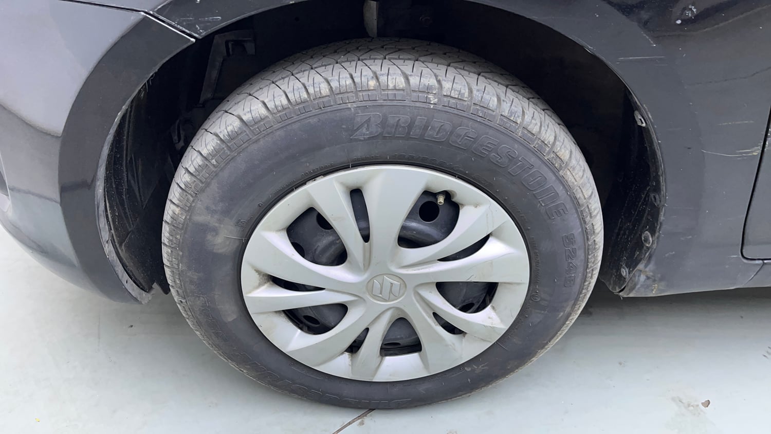 Used 2012 Maruti Suzuki Swift VXi Petrol Manual tyres LEFT FRONT TYRE RIM VIEW