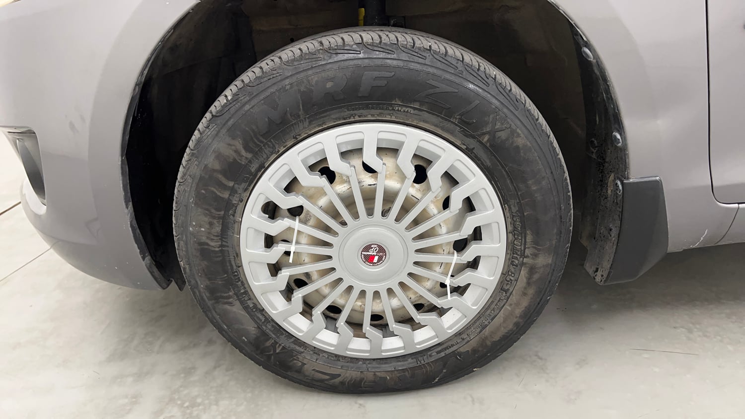 Used 2014 Maruti Suzuki Swift LXi Petrol Manual tyres LEFT FRONT TYRE RIM VIEW