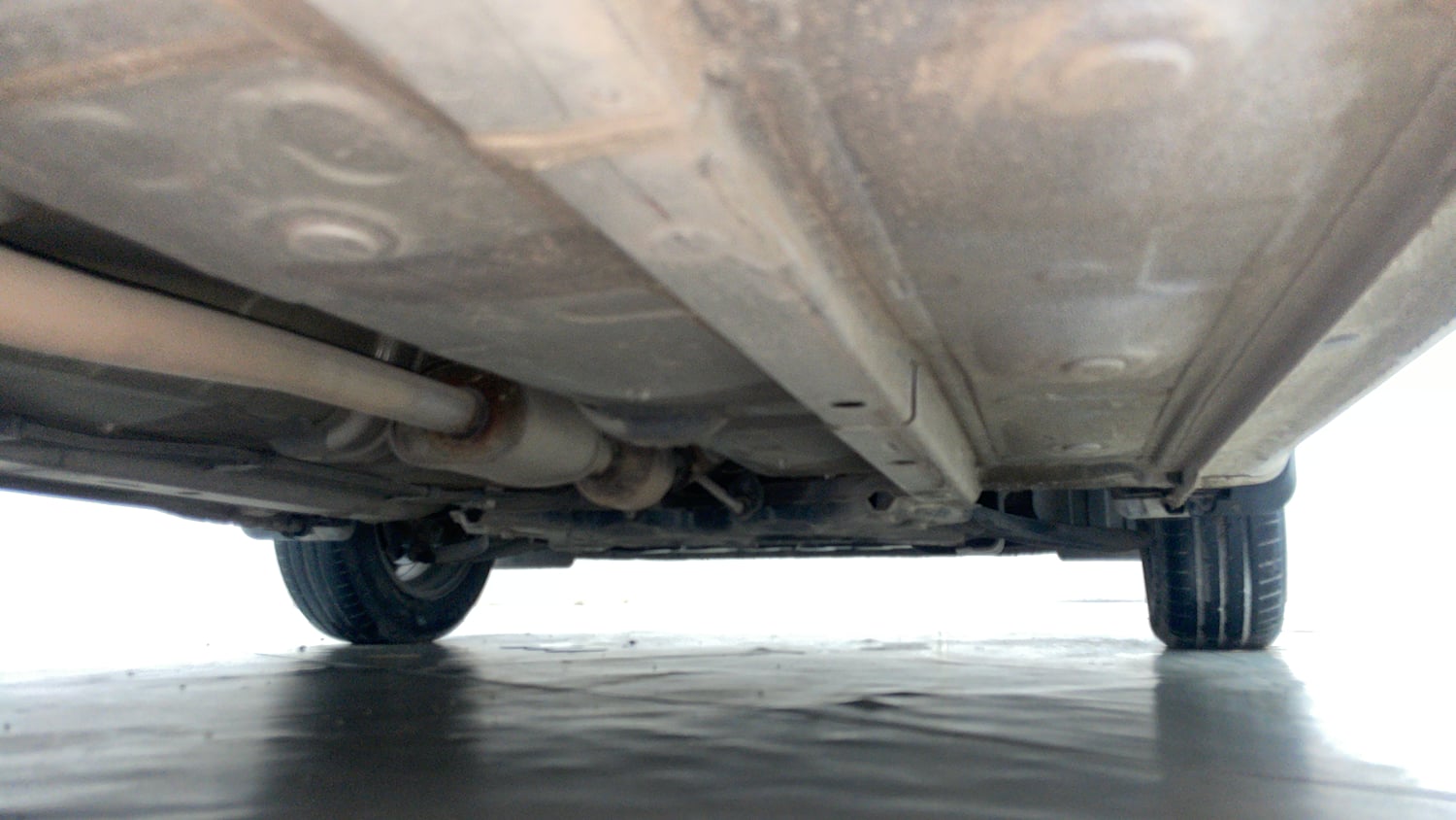 Used 2021 Hyundai Grand i10 Nios Sportz AMT 1.2 Kappa VTVT Petrol Automatic extra REAR RIGHT UNDERBODY VIEW