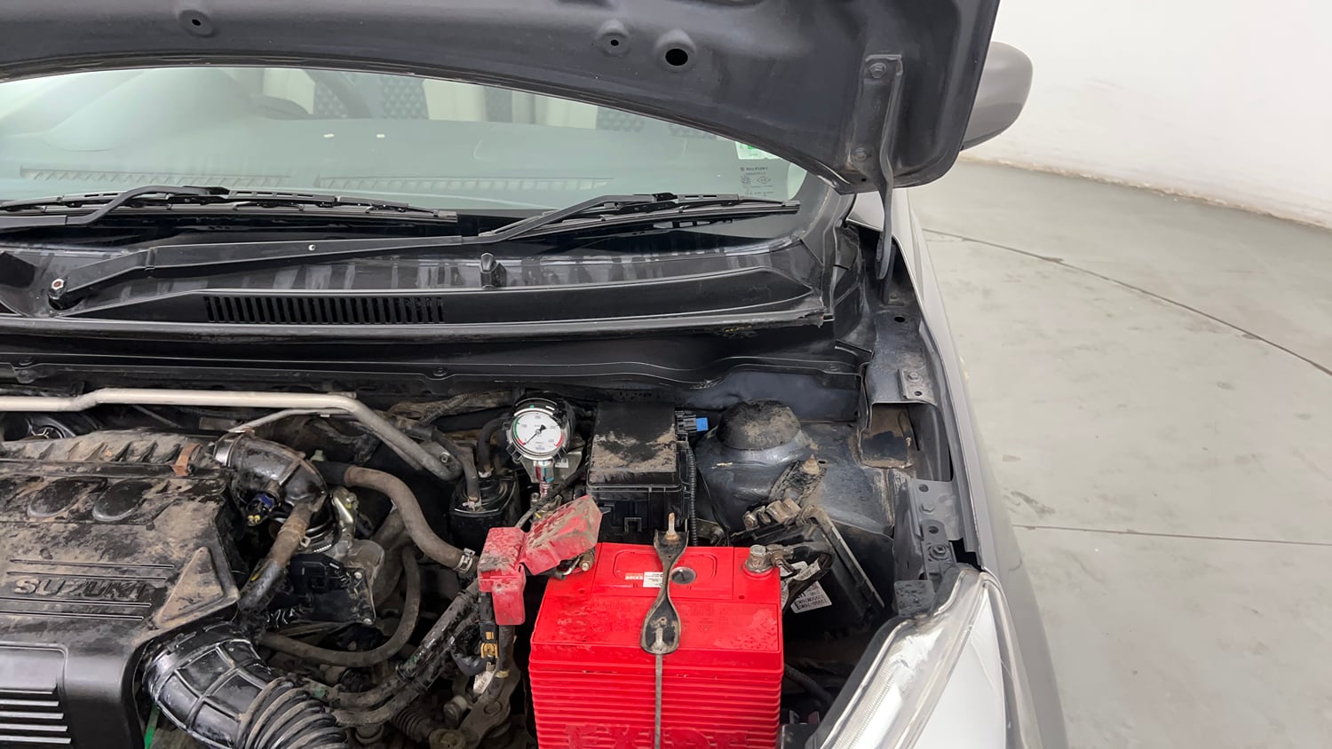 Used 2018 Maruti Suzuki Celerio VXi (O) CNG Cng Manual engine ENGINE LEFT SIDE HINGE & APRON VIEW