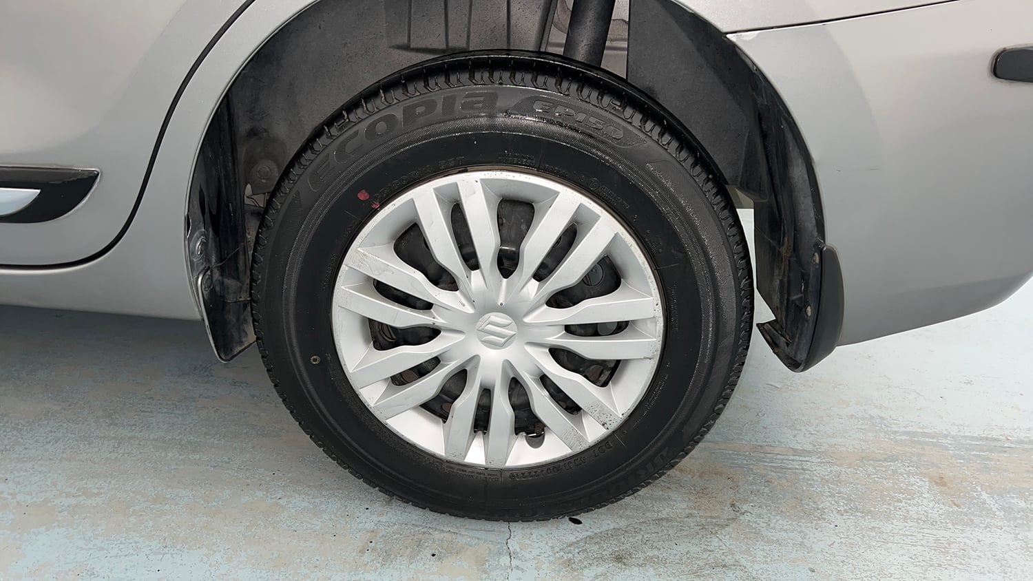 Used 2021 Maruti Suzuki Dzire VXi Petrol Manual tyres LEFT REAR TYRE RIM VIEW