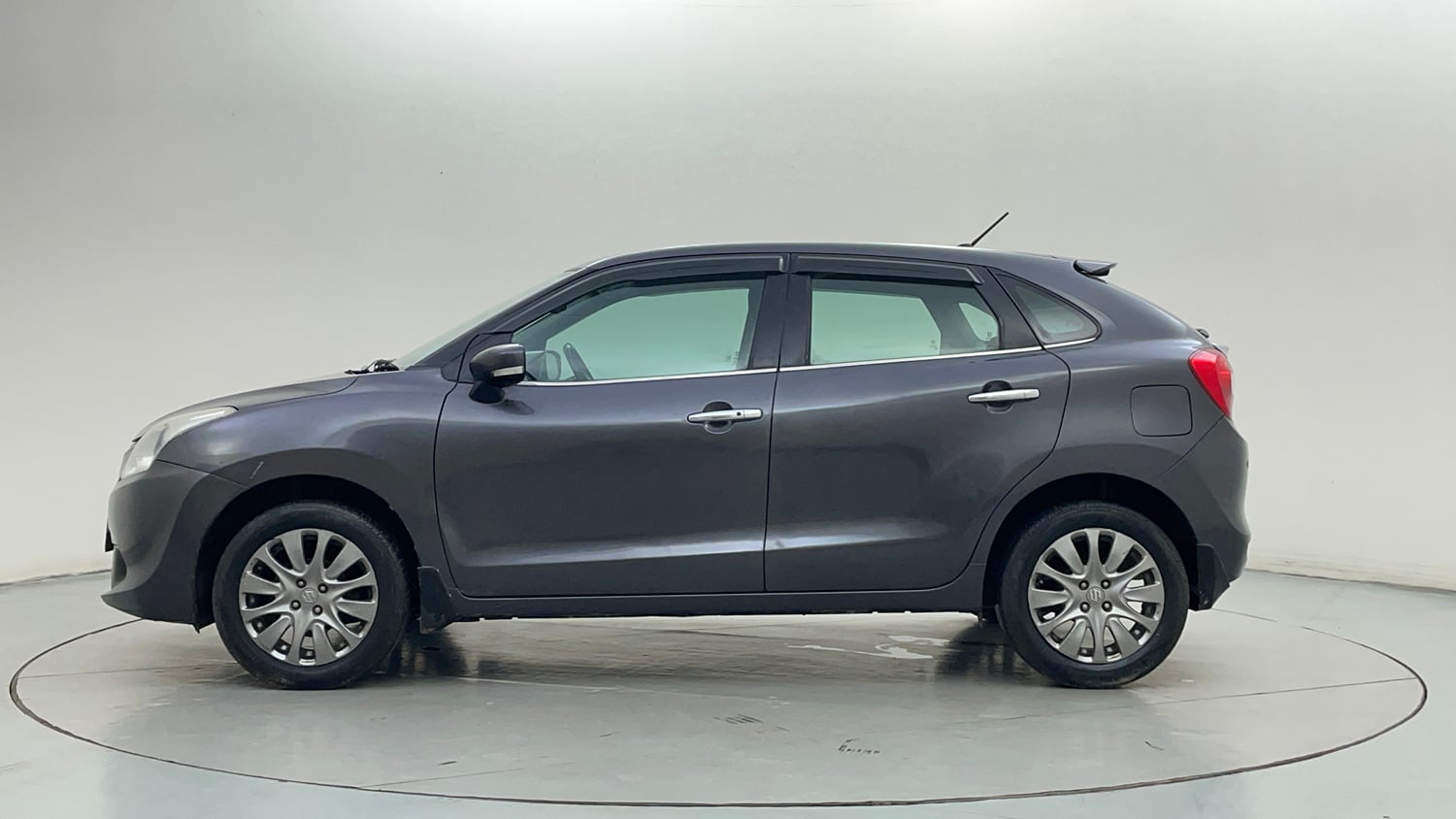 Used 2016 Maruti Suzuki Baleno Zeta 1.2 Petrol Manual exterior LEFT SIDE VIEW