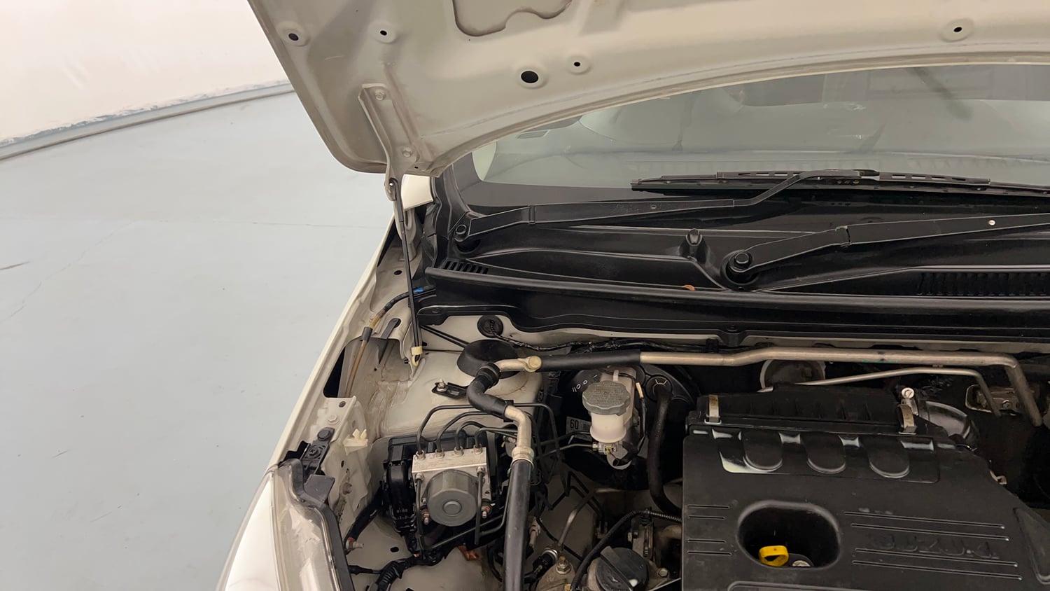 Used 2021 Maruti Suzuki Celerio X VXi AMT Petrol Automatic engine ENGINE RIGHT SIDE HINGE & APRON VIEW