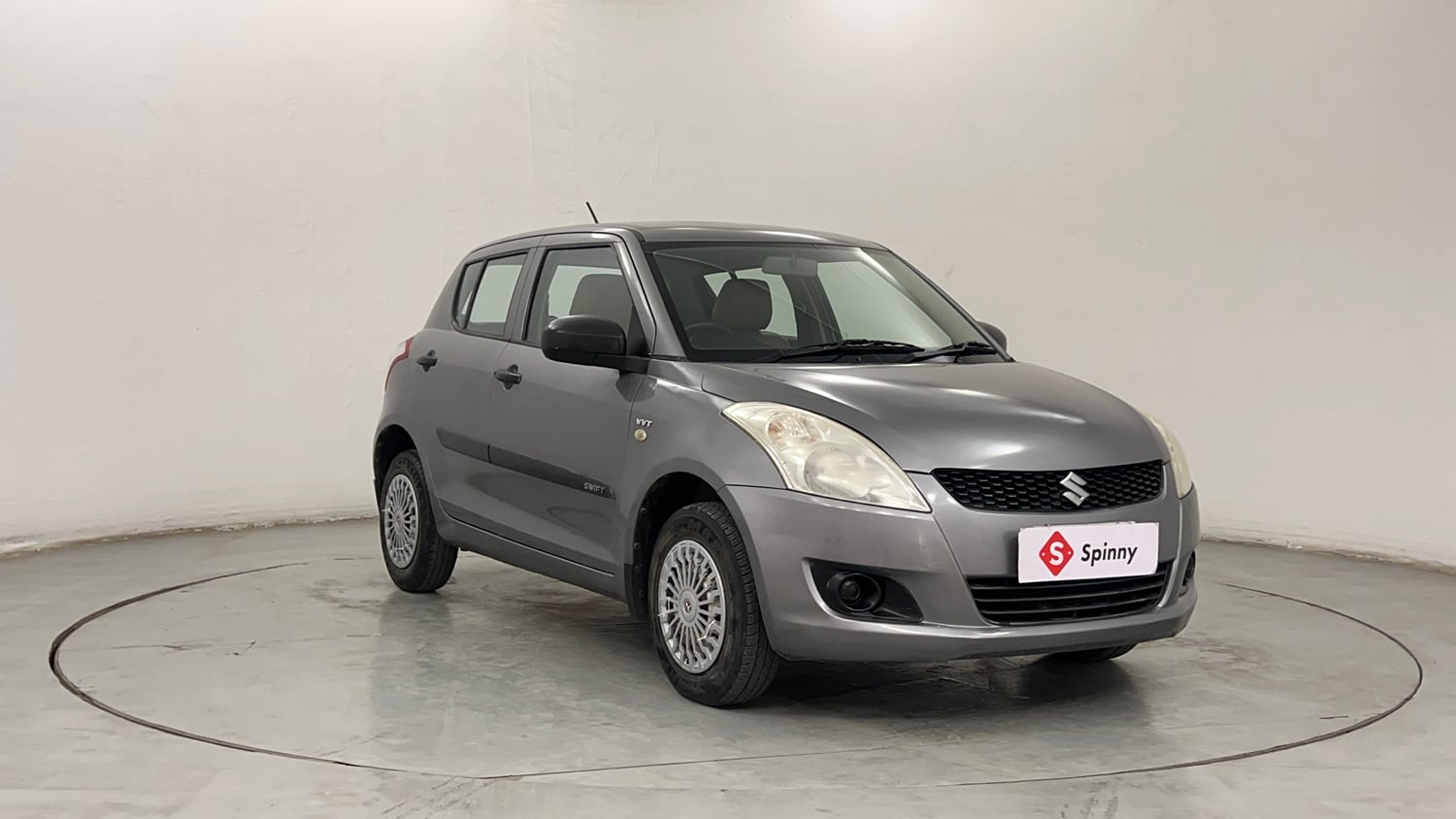 Used 2014 Maruti Suzuki Swift LXi Petrol Manual exterior RIGHT FRONT CORNER VIEW