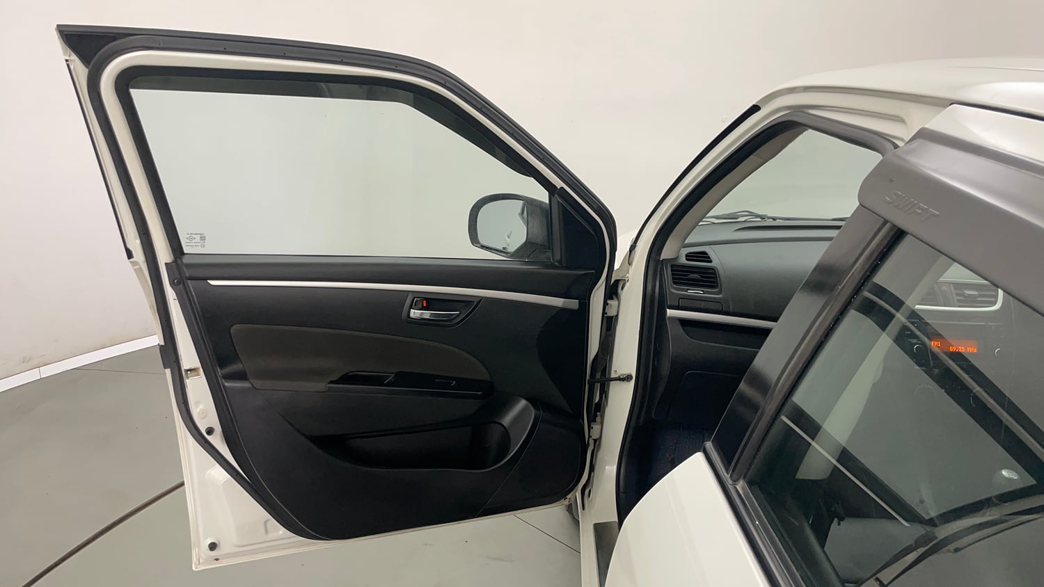 Used 2013 Maruti Suzuki Swift VXi Petrol Manual interior LEFT FRONT DOOR OPEN VIEW