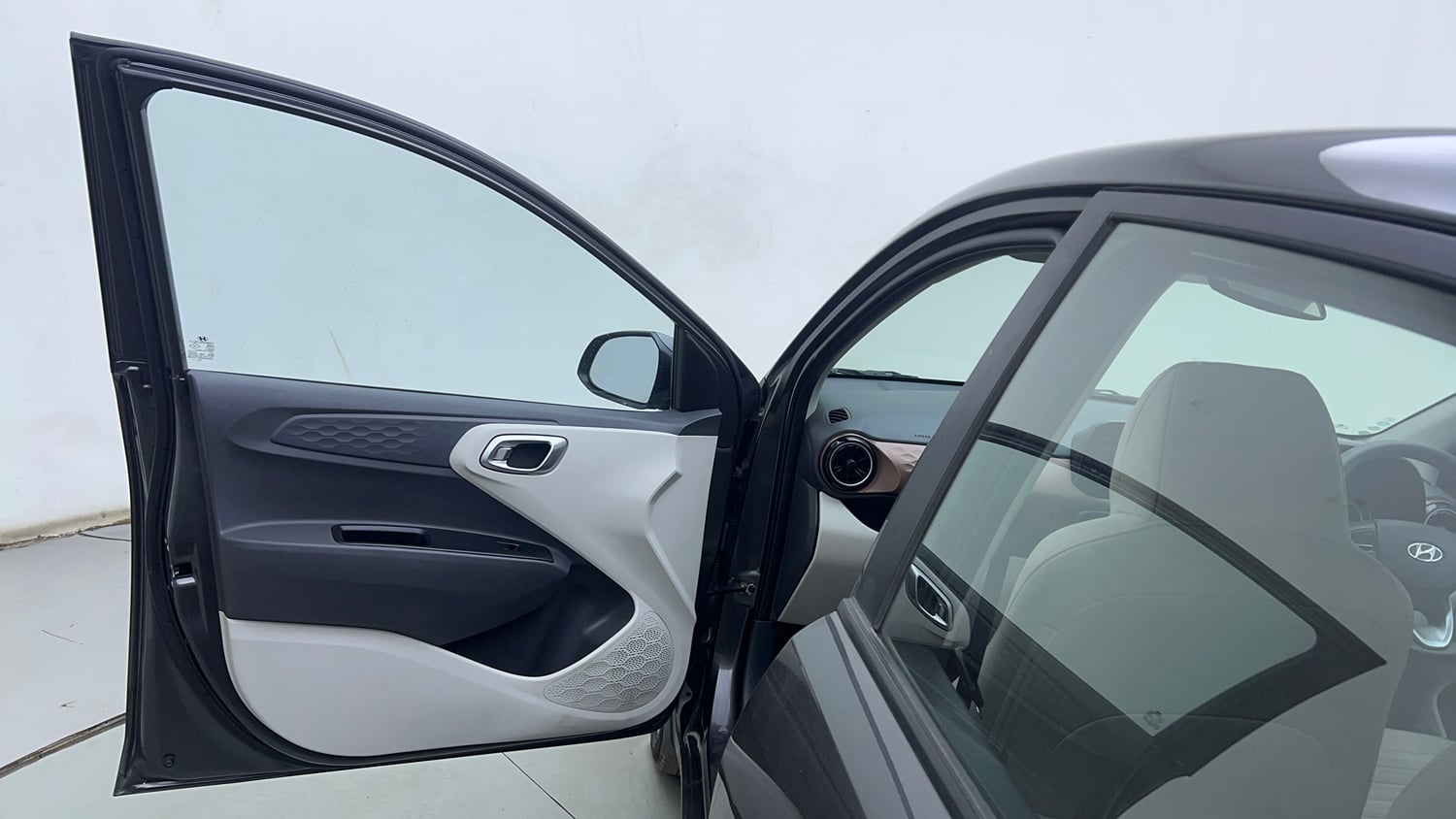 Used 2021 Hyundai Aura SX Plus 1.2 AMT Petrol Petrol Automatic interior LEFT FRONT DOOR OPEN VIEW