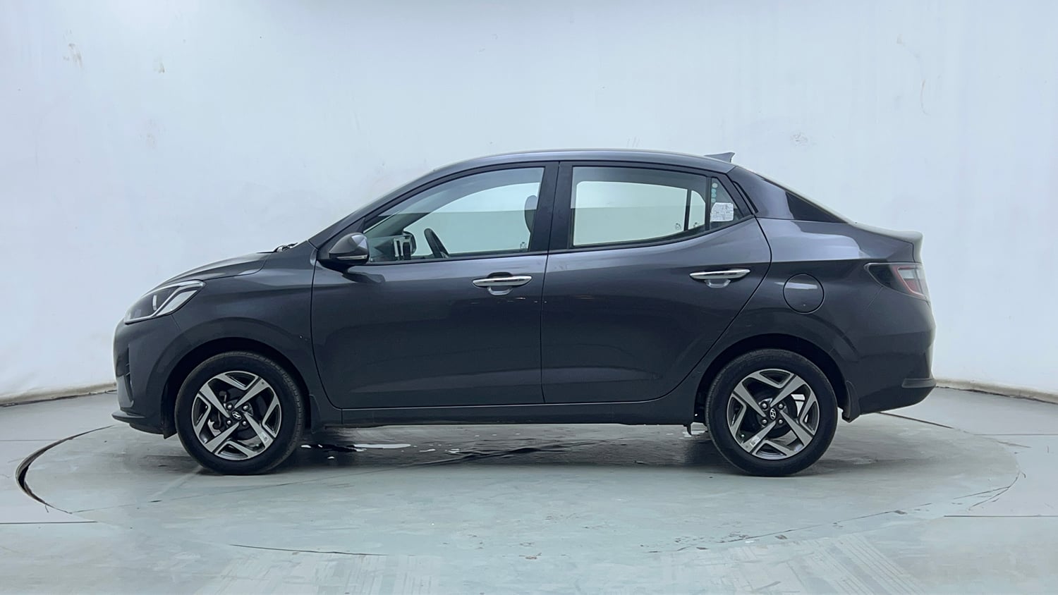 Used 2021 Hyundai Aura SX Plus 1.2 AMT Petrol Petrol Automatic exterior LEFT SIDE VIEW