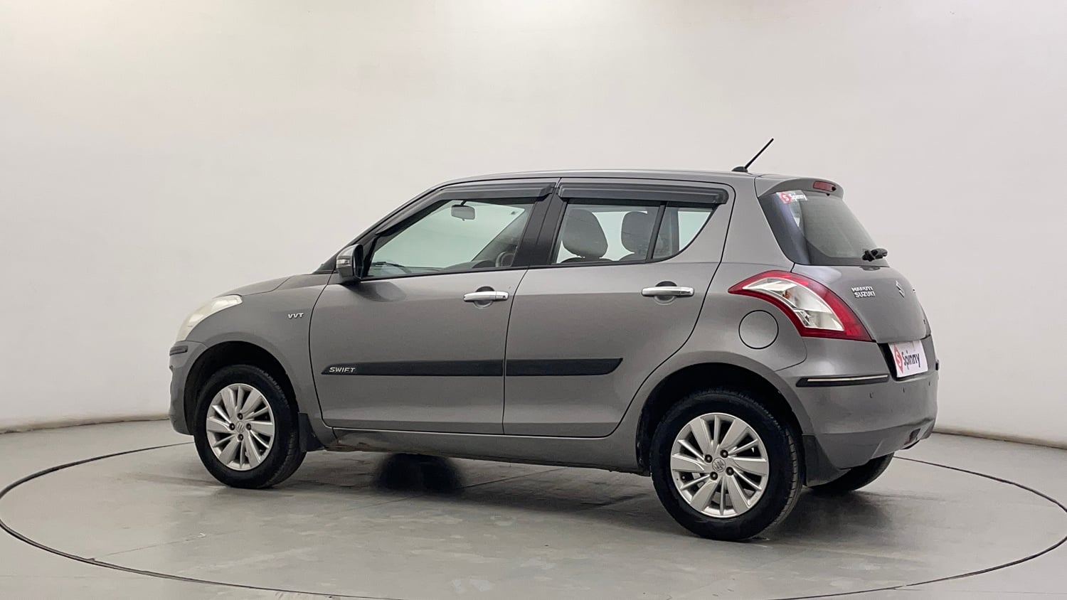 Used 2015 Maruti Suzuki Swift ZXi Petrol Manual exterior LEFT REAR CORNER VIEW